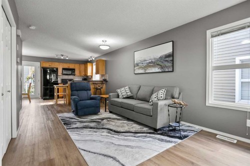 701 Prairie Sound Circle Nw, High River, AB - Indoor Photo Showing Living Room