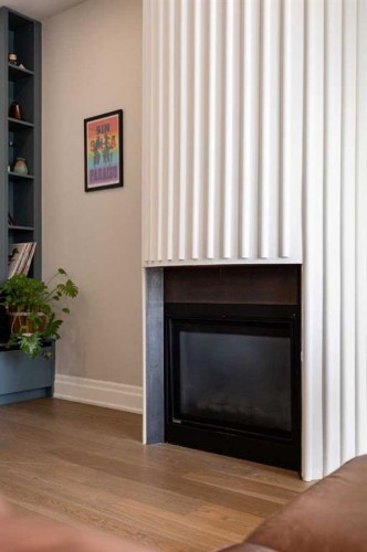 1129 Maggie Street Se, Calgary, AB - Indoor Photo Showing Living Room With Fireplace