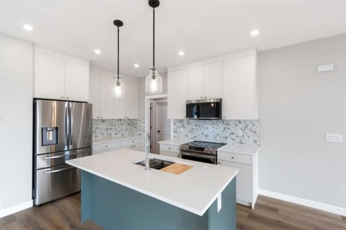 54 Vincent Crescent, Olds, AB - Indoor Photo Showing Kitchen With Double Sink With Upgraded Kitchen