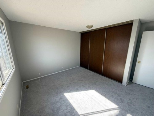 74 Aberdare Way Ne, Calgary, AB - Indoor Photo Showing Other Room