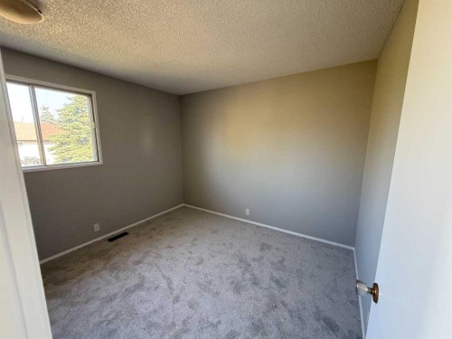 74 Aberdare Way Ne, Calgary, AB - Indoor Photo Showing Other Room