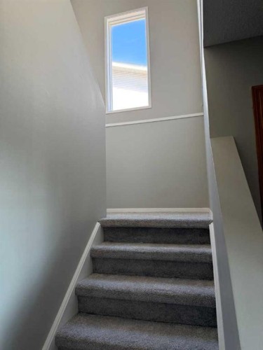 74 Aberdare Way Ne, Calgary, AB - Indoor Photo Showing Other Room