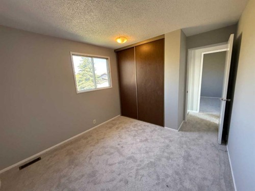 74 Aberdare Way Ne, Calgary, AB - Indoor Photo Showing Other Room