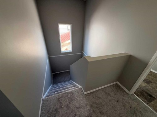74 Aberdare Way Ne, Calgary, AB - Indoor Photo Showing Other Room