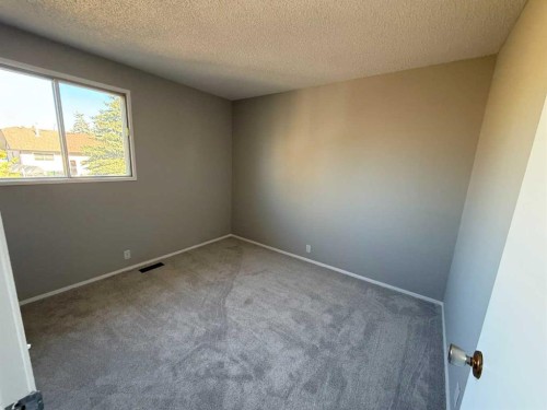 74 Aberdare Way Ne, Calgary, AB - Indoor Photo Showing Other Room
