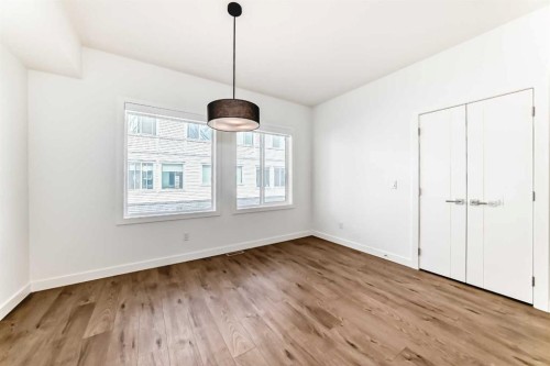 605-335 Creekside Boulevard Sw, Calgary, AB - Indoor Photo Showing Other Room