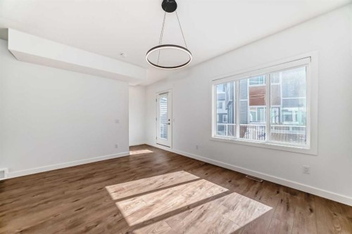 605-335 Creekside Boulevard Sw, Calgary, AB - Indoor Photo Showing Other Room