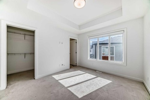 605-335 Creekside Boulevard Sw, Calgary, AB - Indoor Photo Showing Other Room