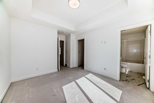 605-335 Creekside Boulevard Sw, Calgary, AB - Indoor Photo Showing Other Room