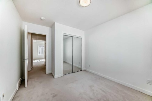 605-335 Creekside Boulevard Sw, Calgary, AB - Indoor Photo Showing Other Room