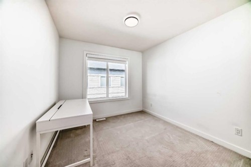 605-335 Creekside Boulevard Sw, Calgary, AB - Indoor Photo Showing Other Room