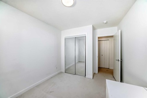 605-335 Creekside Boulevard Sw, Calgary, AB - Indoor Photo Showing Other Room