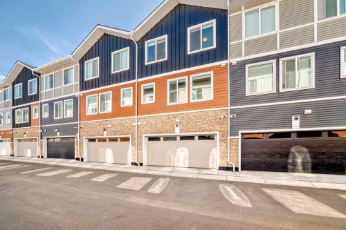605-335 Creekside Boulevard Sw, Calgary, AB - Outdoor With Facade