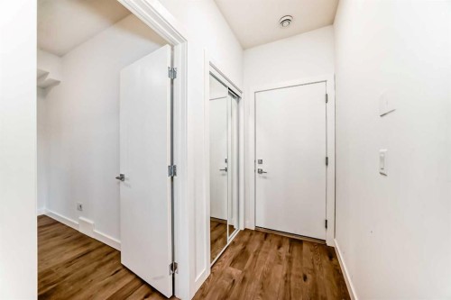 605-335 Creekside Boulevard Sw, Calgary, AB - Indoor Photo Showing Other Room