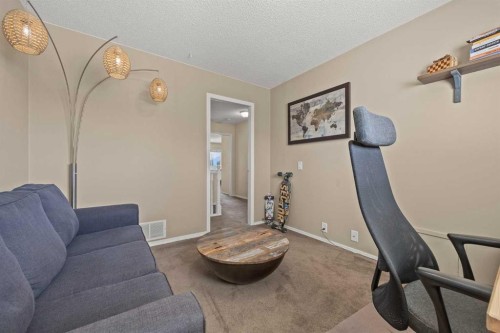 71 Somercrest Close Sw, Calgary, AB - Indoor Photo Showing Gym Room