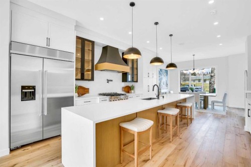 4711 19 Avenue Nw, Calgary, AB - Indoor Photo Showing Kitchen With Upgraded Kitchen