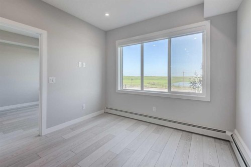 2215-6 Merganser Drive West, Chestermere, AB - Indoor Photo Showing Other Room