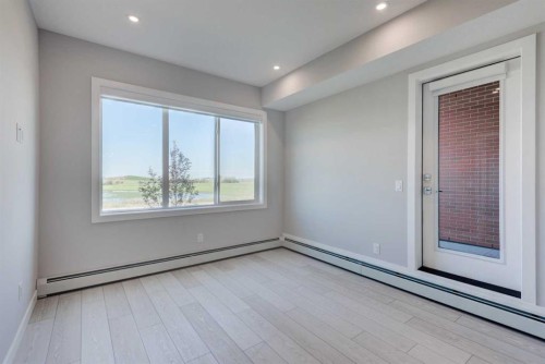 2215-6 Merganser Drive West, Chestermere, AB - Indoor Photo Showing Other Room