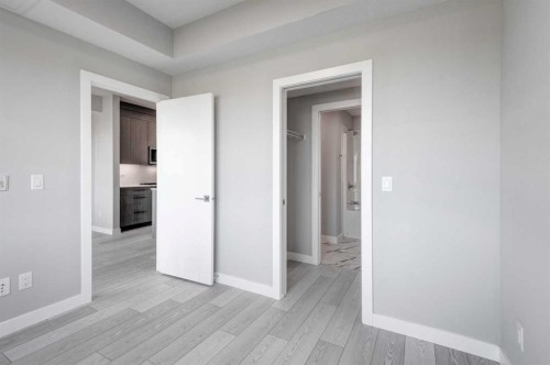 2215-6 Merganser Drive West, Chestermere, AB - Indoor Photo Showing Other Room