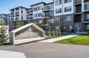 2215-6 Merganser Drive West, Chestermere, AB  - Outdoor With Balcony With Facade 