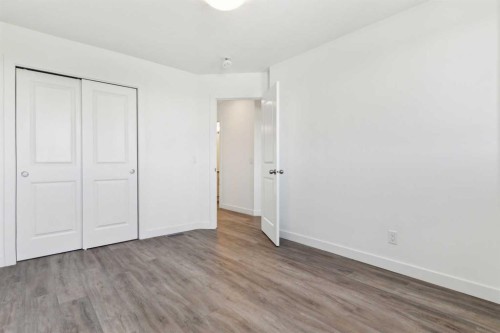 203-24 Rivercrest Drive, Cochrane, AB - Indoor Photo Showing Other Room