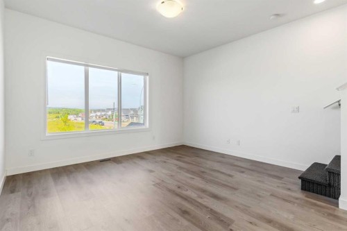 203-24 Rivercrest Drive, Cochrane, AB - Indoor Photo Showing Other Room