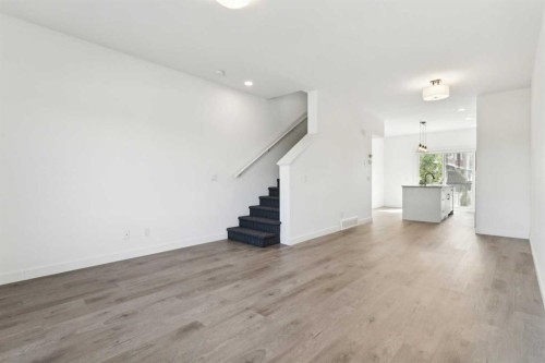 203-24 Rivercrest Drive, Cochrane, AB - Indoor Photo Showing Other Room