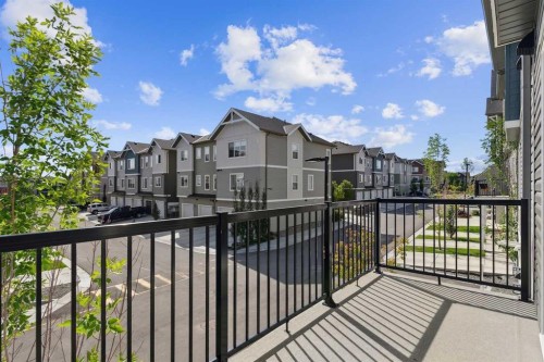 203-24 Rivercrest Drive, Cochrane, AB - Outdoor With Exterior