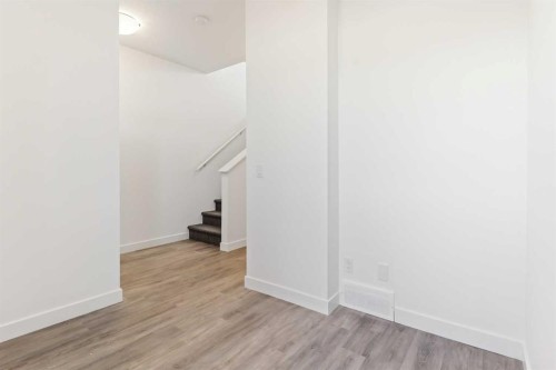 203-24 Rivercrest Drive, Cochrane, AB - Indoor Photo Showing Other Room