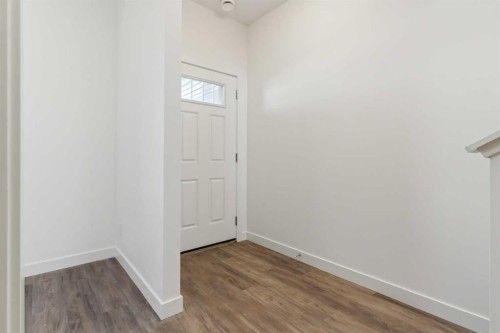 203-24 Rivercrest Drive, Cochrane, AB - Indoor Photo Showing Other Room