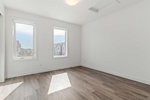 203-24 Rivercrest Drive, Cochrane, AB - Indoor Photo Showing Other Room