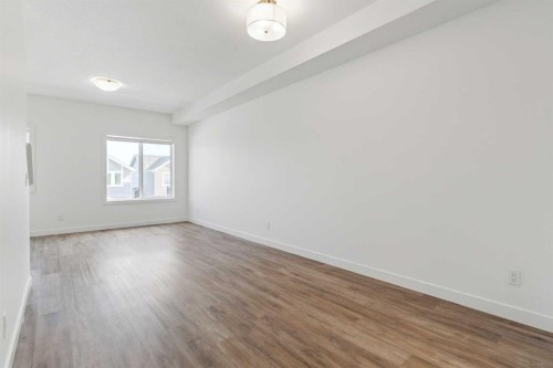 703-24 Rivercrest Drive, Cochrane, AB - Indoor Photo Showing Other Room