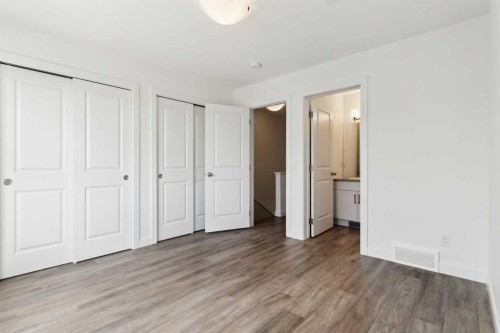 703-24 Rivercrest Drive, Cochrane, AB - Indoor Photo Showing Other Room