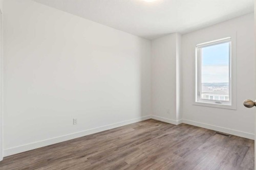 703-24 Rivercrest Drive, Cochrane, AB - Indoor Photo Showing Other Room