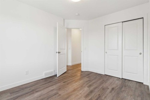 703-24 Rivercrest Drive, Cochrane, AB - Indoor Photo Showing Other Room