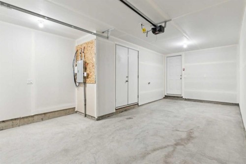 703-24 Rivercrest Drive, Cochrane, AB - Indoor Photo Showing Garage