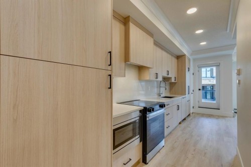 1314-4270 Norford Avenue Nw, Calgary, AB - Indoor Photo Showing Kitchen