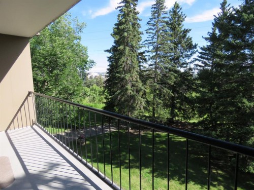 204-328 Cedar Crescent Sw, Calgary, AB - Outdoor With Balcony
