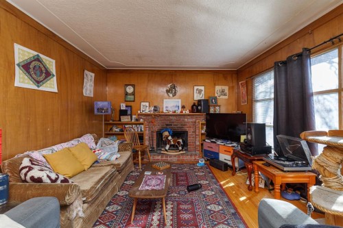 2824 Parkdale Boulevard Nw, Calgary, AB - Indoor With Fireplace