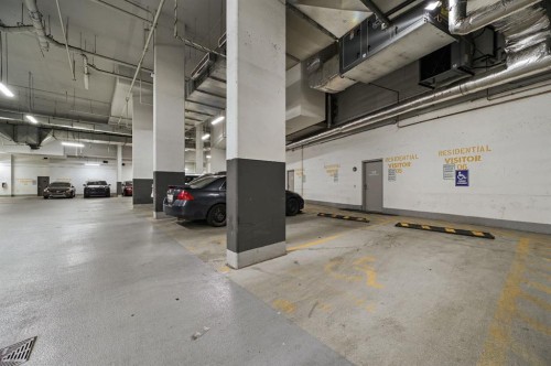 1102-519 Riverfront Avenue Se, Calgary, AB - Indoor Photo Showing Garage