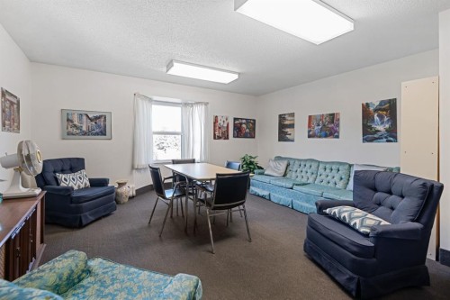 417-3730 50 Street Nw, Calgary, AB - Indoor Photo Showing Living Room