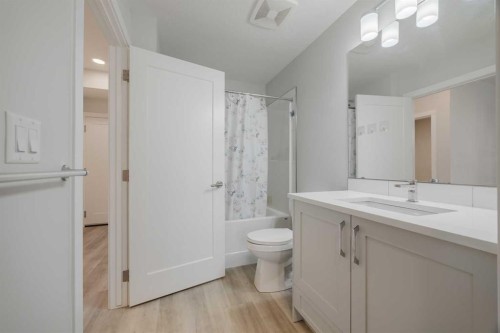 102-200 Shawnee Square Sw, Calgary, AB - Indoor Photo Showing Bathroom