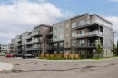 102-200 Shawnee Square Sw, Calgary, AB  - Outdoor With Facade 
