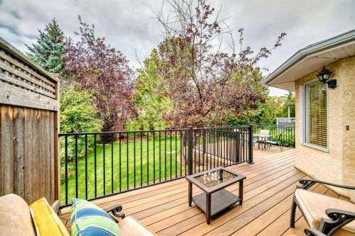 83 Gleneagles Close, Cochrane, AB - Outdoor With Deck Patio Veranda With Exterior