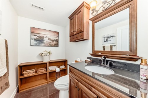 83 Gleneagles Close, Cochrane, AB - Indoor Photo Showing Bathroom