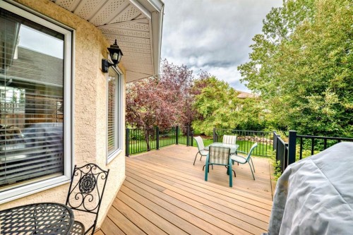 83 Gleneagles Close, Cochrane, AB - Outdoor With Deck Patio Veranda With Exterior