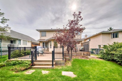 83 Gleneagles Close, Cochrane, AB - Outdoor With Deck Patio Veranda