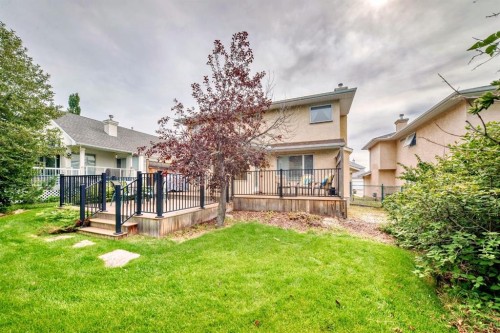83 Gleneagles Close, Cochrane, AB - Outdoor With Deck Patio Veranda