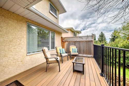 83 Gleneagles Close, Cochrane, AB - Outdoor With Deck Patio Veranda With Exterior