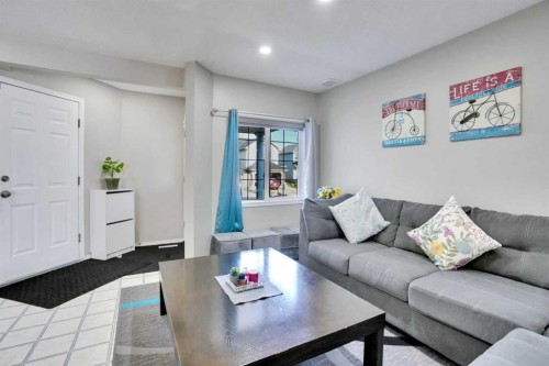 140 Saddlehorn Crescent Ne, Calgary, AB - Indoor Photo Showing Living Room